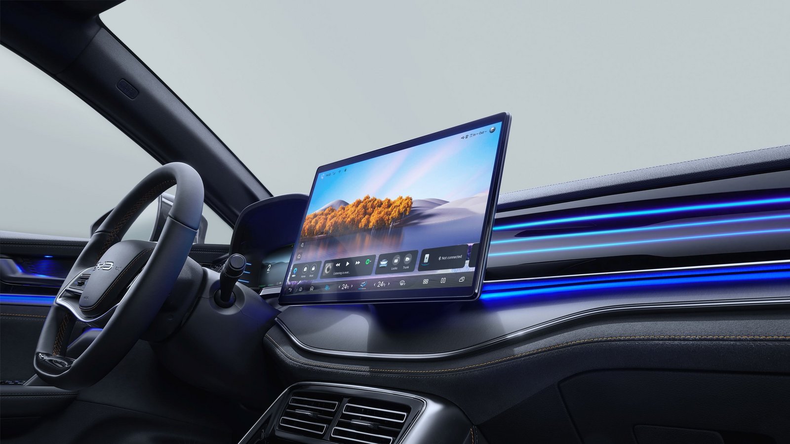 Armaturenbrett des BYD TANG mit großem, freistehendem Touchscreen und blau beleuchtetem Dekorstreifen